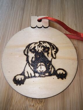Hand Crafted Wooden Dog Ornament with Red Ribbon
